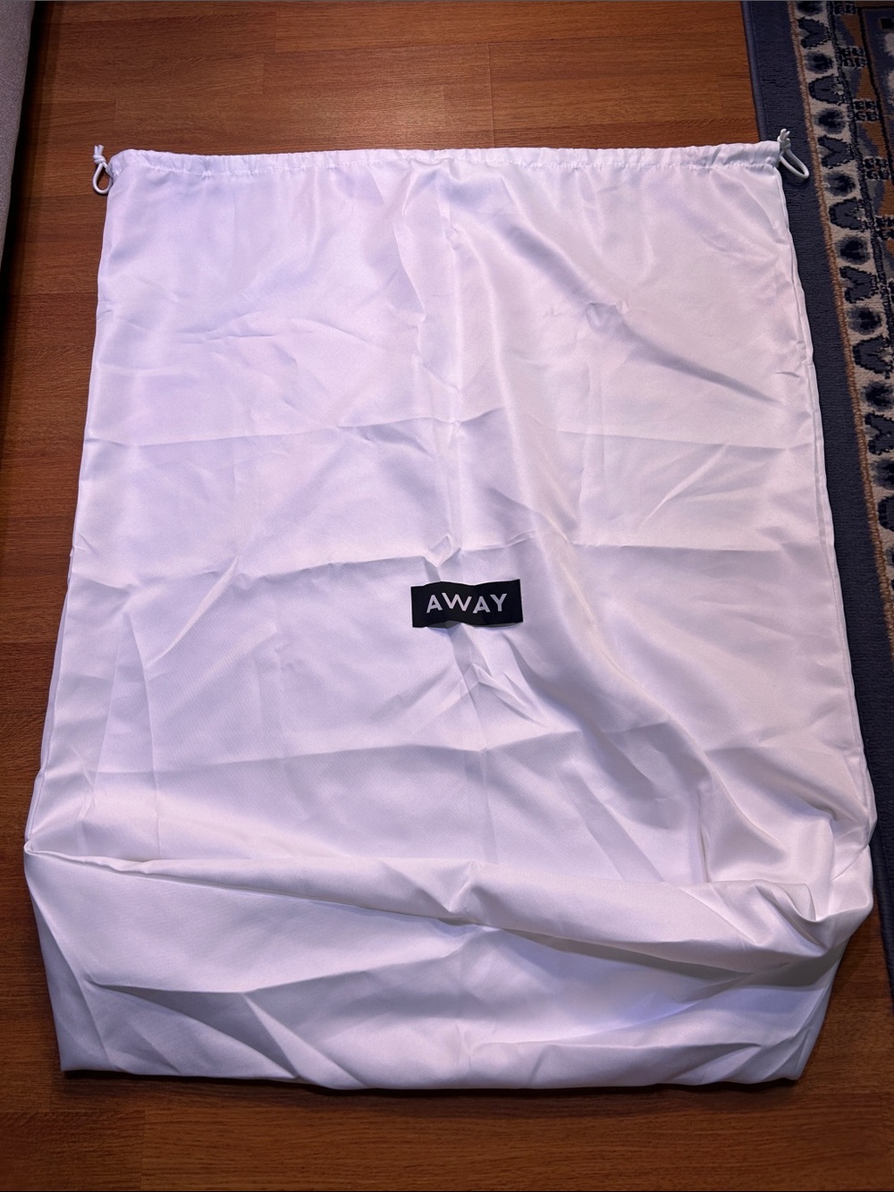 Away White Drawstring Travel Storage Bag with Logo